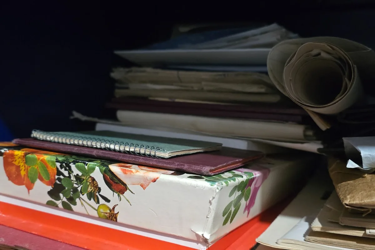 Stack of notebooks and papers from the Otter Stream archive